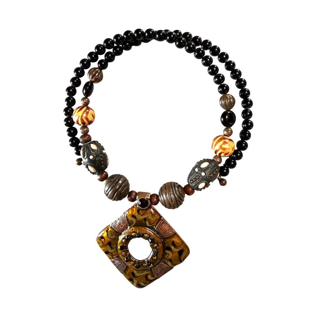 Necklace: copper colors with black beads+ 11" center 1 3/4" square design choker